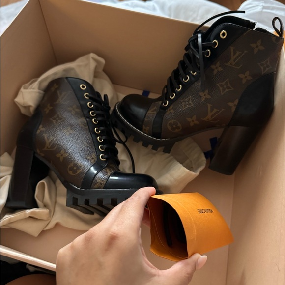 Star ankle trail Louis Vuitton boots - Picture 1 of 4